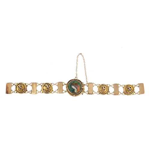 106 - Manner of Liberty & Co, Art Nouveau unmarked gold and enamel bracelet decorated with a female, tests... 