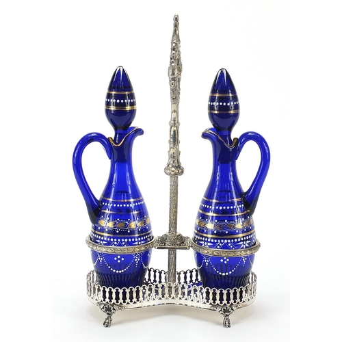 874 - Silver plated oil and vinegar bottle stand with blue glass decanters, 35cm high