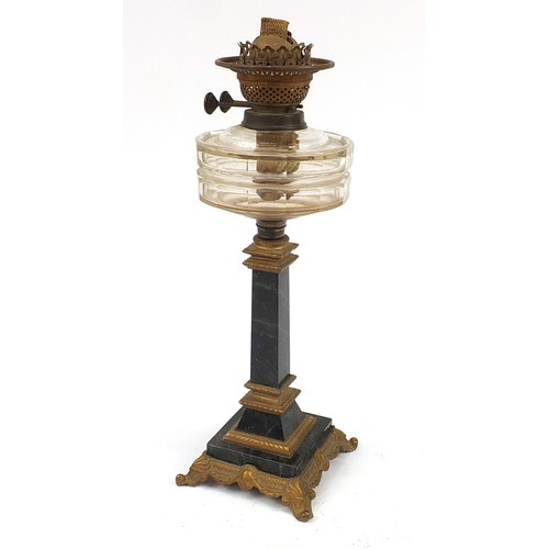 872 - Victorian ornate brass and marble oil lamp base with glass reservoir, 48cm high