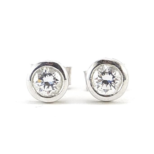 112 - Pair of 18ct white gold diamond stud earrings, 6mm in diameter, 1.9g