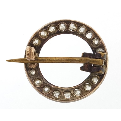 114 - Unmarked gold diamond brooch, 1.6cm in diameter, 1.5g