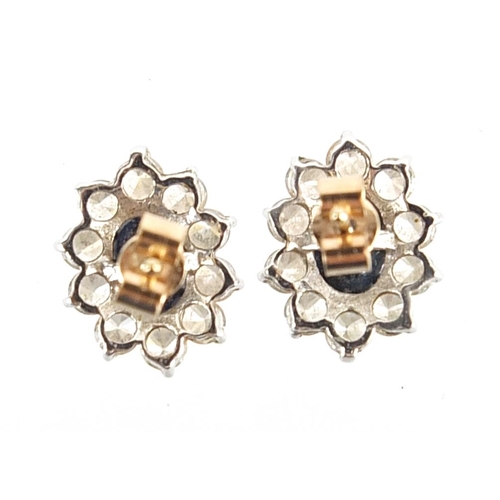 174 - Pair of unmarked 9ct gold sapphire and clear stone cluster stud earrings, 1.2cm high, 1.4g