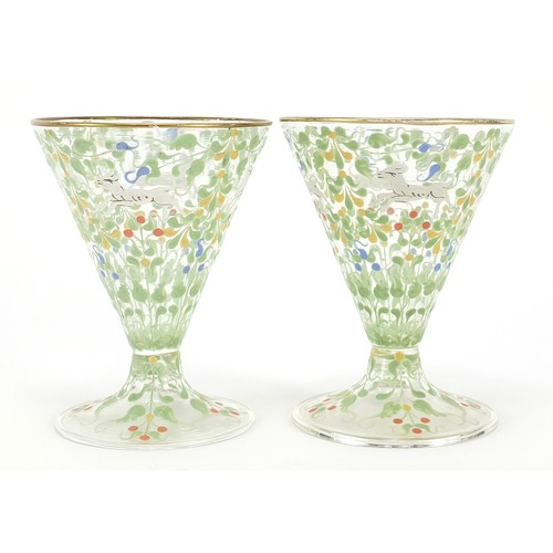 999 - Bohemian cocktail glasses in the manner of Moser, each enamelled with wild animals amongst flowers, ... 