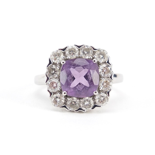 189 - 9ct white gold amethyst and diamond ring, each diamond approximately 2.2mm, size K, 4.0g