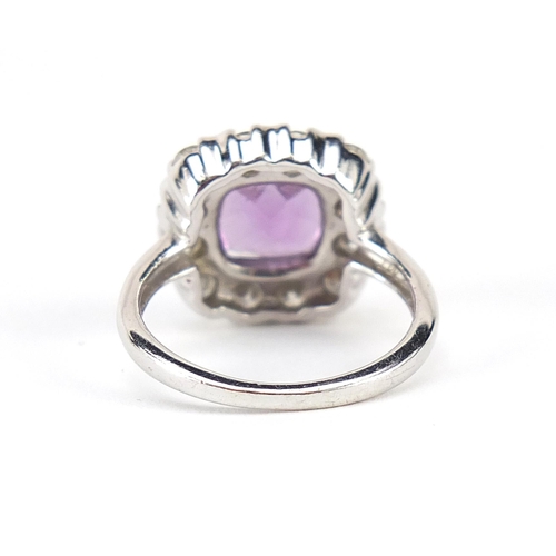 189 - 9ct white gold amethyst and diamond ring, each diamond approximately 2.2mm, size K, 4.0g