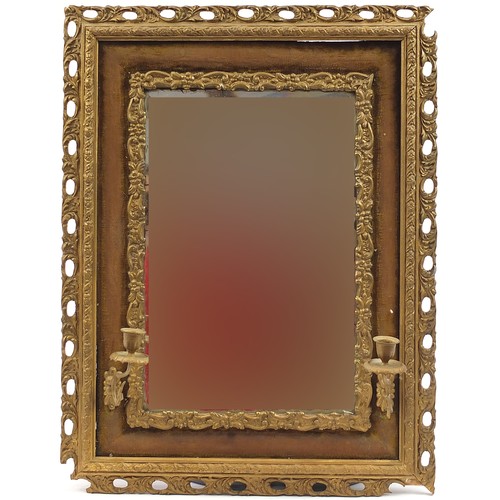 2100 - Gilt framed wall mirror with a pair of candle sconces and beveled glass, 68cm x 52.5cm