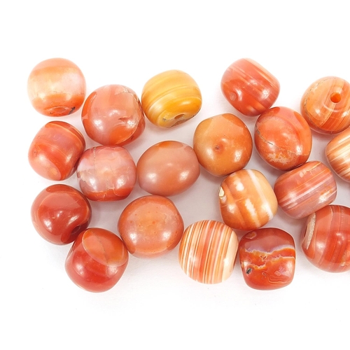 1853 - Group of Islamic agate beads, each approximately 2cm in diameter