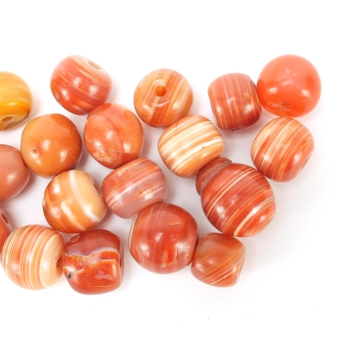 1853 - Group of Islamic agate beads, each approximately 2cm in diameter