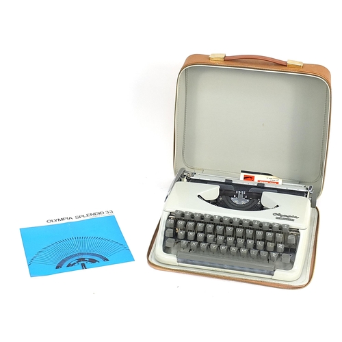 126 - Cased Olympia Splendid 33 retro typewriter