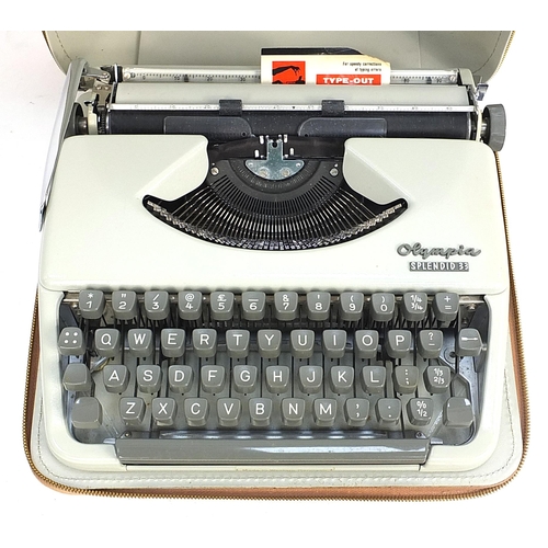 126 - Cased Olympia Splendid 33 retro typewriter