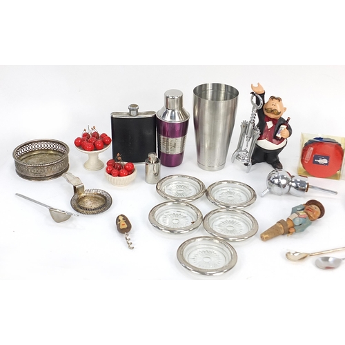 69 - Assorted drinking items including corkscrews, ceramic cherries, silver plated coasters, wooden cup h... 