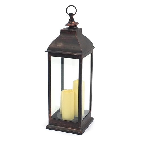 128 - Floor standing battery operated candle lantern, 70cm high