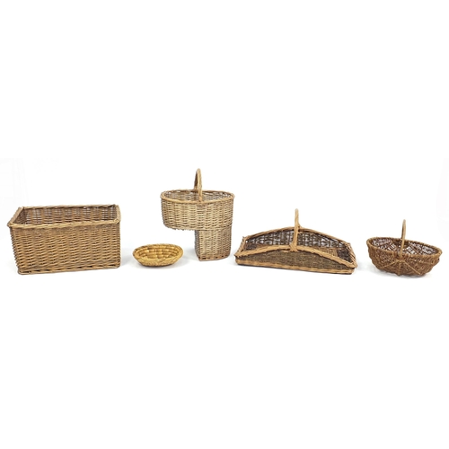 32 - Wicker step basket, trug style basket, deep basket and two others, the largest 26cm H x 48cm W x 34c... 