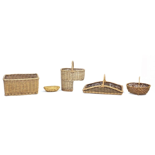 32 - Wicker step basket, trug style basket, deep basket and two others, the largest 26cm H x 48cm W x 34c... 