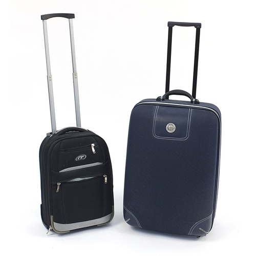 212 - Odyssey Companion suitcase and International Traveller suitcase, the largest 65cm high