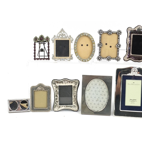 79 - Quantity of assorted metal photo frames, some with jewelled decoration, the largest 16cm x 12cm