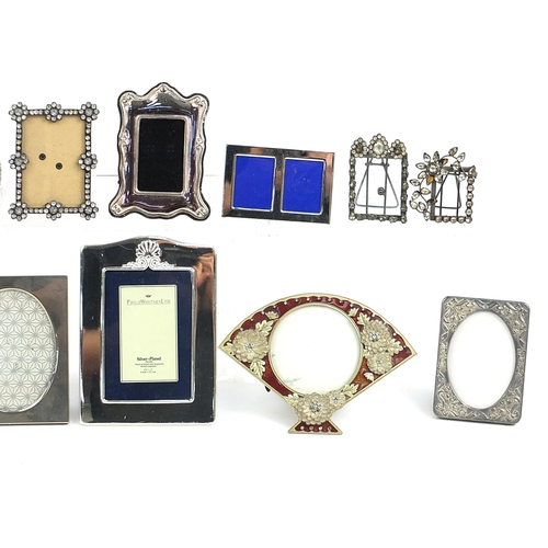 79 - Quantity of assorted metal photo frames, some with jewelled decoration, the largest 16cm x 12cm