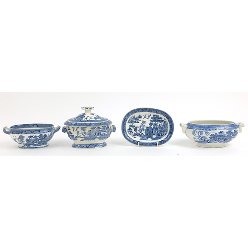 76 - Old blue and white Willow pattern tureens, covers and stands, the largest 20cm wide