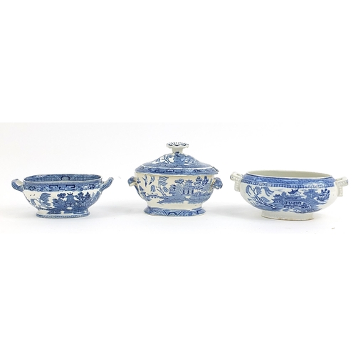 76 - Old blue and white Willow pattern tureens, covers and stands, the largest 20cm wide