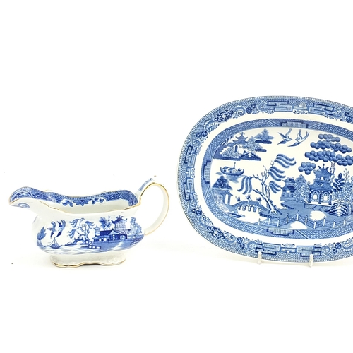 77 - Wedgwood blue and white Willow pattern including two jugs, sauce boat and meat plate, the largest 26... 