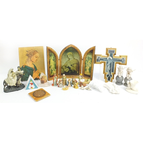 225 - Religious items including ceramic nativity scene, angels and wooden ikons, the largest 40cm high