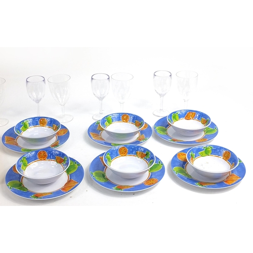 264 - Plastic fruit design picnic set, wine glasses and brightly coloured cutlery