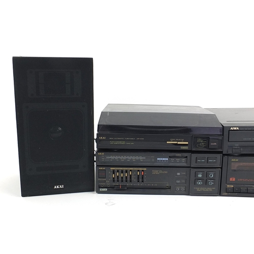 168 - Akai stereo system including seperate cassette recorder, tuner, radio record deck and Aiwa digital C... 