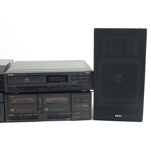 168 - Akai stereo system including seperate cassette recorder, tuner, radio record deck and Aiwa digital C... 