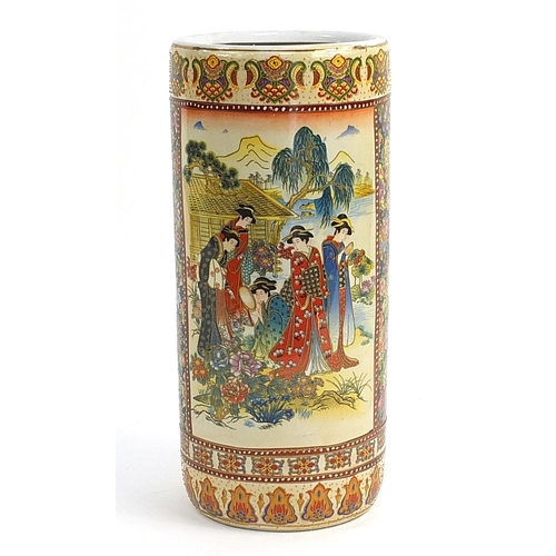 105 - Oriental ceramic stick stand decorated with ladies and flowers, 47cm high