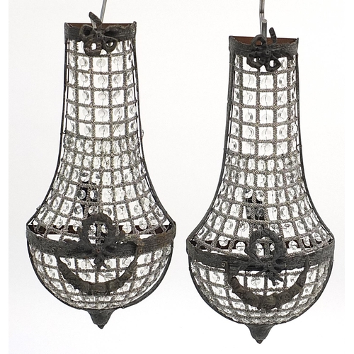 1500 - Pair of ornate bronzed metal chandelier design wall lights with bows, 50cm high