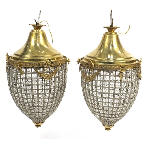 1498 - Pair of ornate gilt brass acorn chandeliers with swags and bows, 56cm high