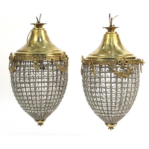 1498 - Pair of ornate gilt brass acorn chandeliers with swags and bows, 56cm high