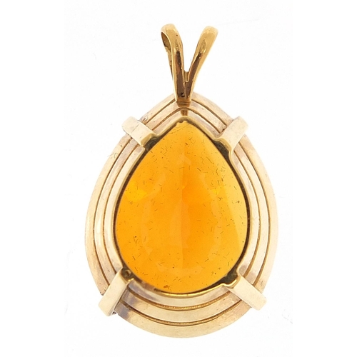 86 - Unmarked gold citrine tear drop pendant, (tests as 15ct gold) 3cm high, 14.2g