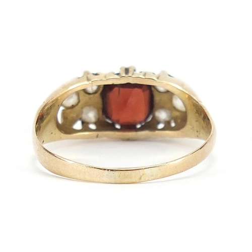 142 - Unmarked gold garnet and diamond ring, size O, 2.6g