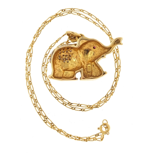 66 - 90% gold elephant pendant set with diamonds and a ruby, on a 18ct gold necklace, 13.0g and 2.3g, the... 