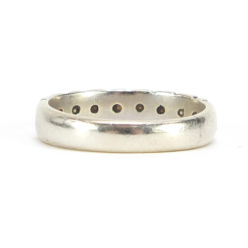 18 - Unmarked white metal diamond half eternity ring, size N, 3.9g