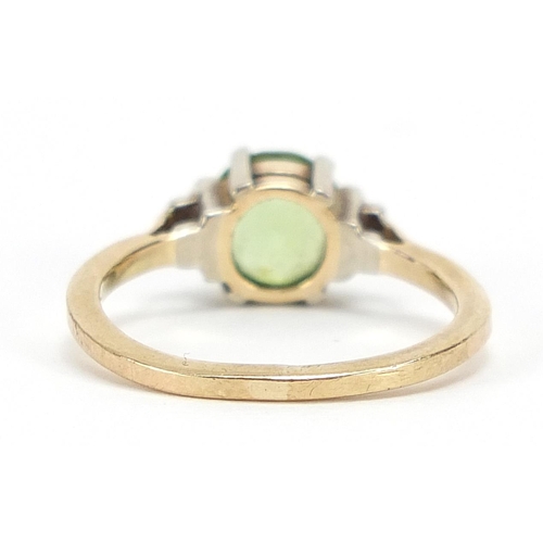 318 - Unmarked gold green stone solitaire ring, possibly peridot, size K, 2.2g