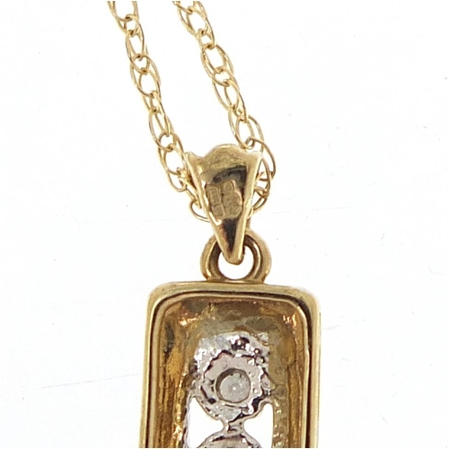 107 - 9ct gold diamond pendant on a 9ct gold necklace, 2.6cm high and 45cm in length, 1.9g