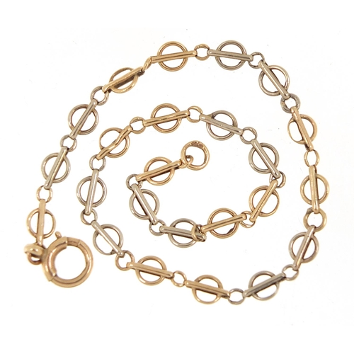 211 - 9ct two tone gold bracelet, 19cm in length, 2.1g