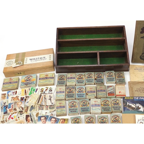 1986 - Large collection of cigarette cards, Barratts Hologrem cards and world stamps, some in boxes and alb... 