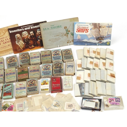 1986 - Large collection of cigarette cards, Barratts Hologrem cards and world stamps, some in boxes and alb... 