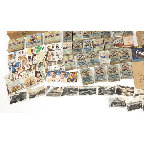 1986 - Large collection of cigarette cards, Barratts Hologrem cards and world stamps, some in boxes and alb... 