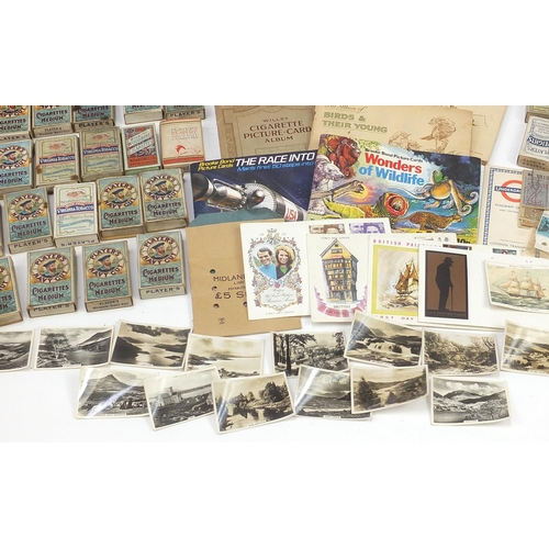 1986 - Large collection of cigarette cards, Barratts Hologrem cards and world stamps, some in boxes and alb... 