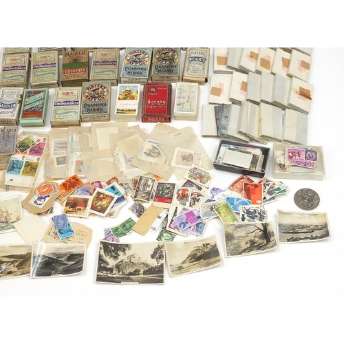 1986 - Large collection of cigarette cards, Barratts Hologrem cards and world stamps, some in boxes and alb... 