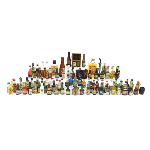 1981 - Large collection of alcohol miniatures and larger bottles of alcohol including Smirnoff vodka, Beefe... 