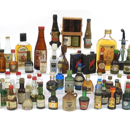 1981 - Large collection of alcohol miniatures and larger bottles of alcohol including Smirnoff vodka, Beefe... 