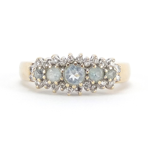 310 - 9ct gold diamond and aquamarine cluster ring, size L, 3.3g