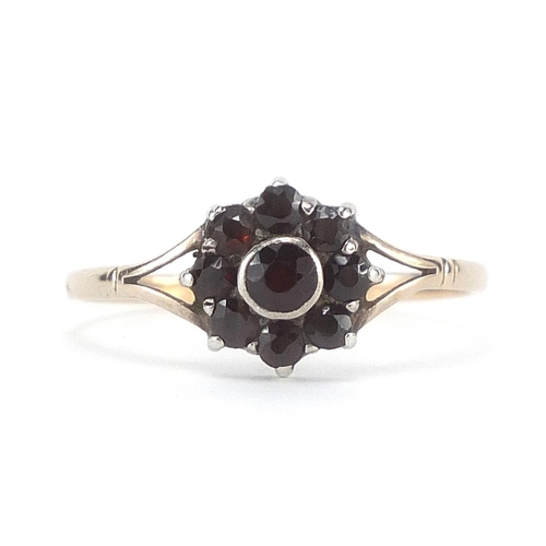 287 - 9ct gold and silver Bohemian garnet flower head ring, size N/M, 1.4g