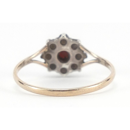 287 - 9ct gold and silver Bohemian garnet flower head ring, size N/M, 1.4g