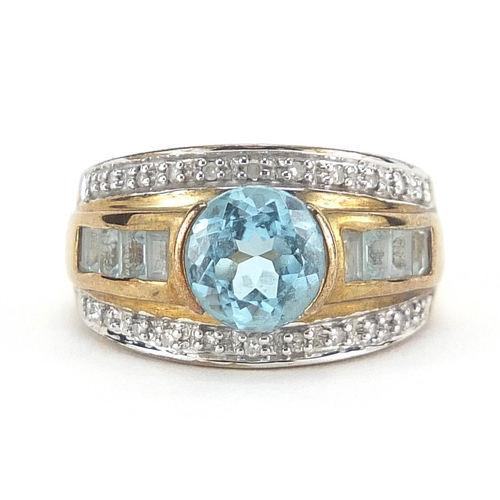 306 - 9ct gold diamond and blue topaz three row ring, size N, 5.5g